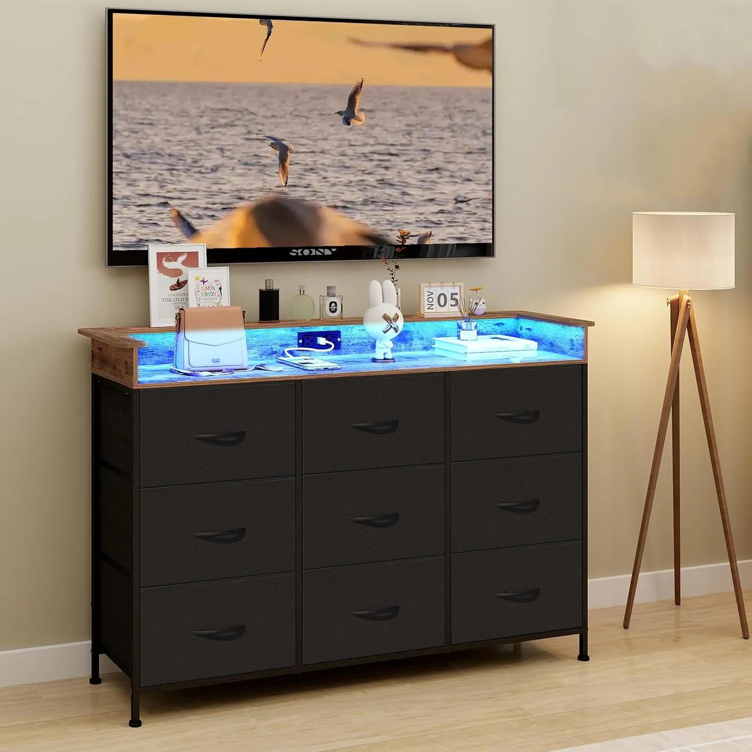 EXOTICA Black Dresser for Bedroom with Charging Station 9 Drawers Dresser with LED Light and USB Ports for Hallway Entryway Closets Sturdy Steel Frame Wood Top (Faux Leather Fabric Drawer)