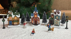 MOMENTS IN TIME Christmas Village 12 pc Set, with LED Lights, Battery Operated (not Included) (5" H to 6.5" H Buildings)