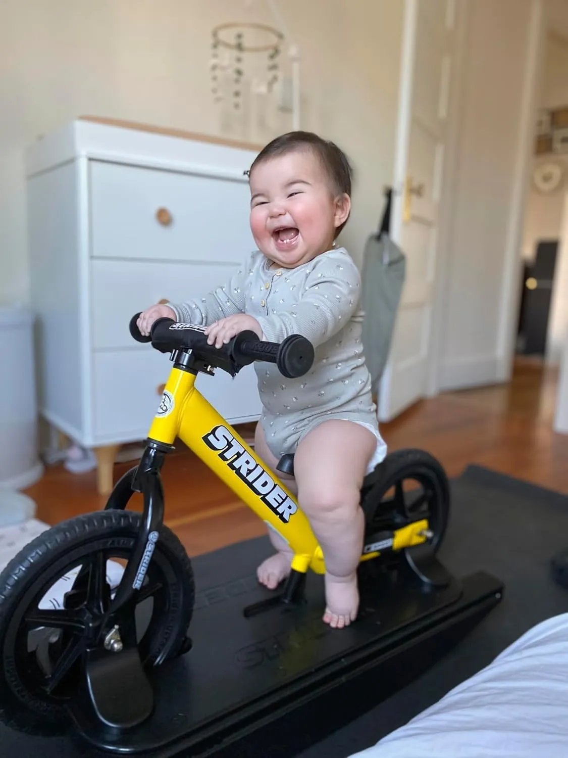 Strider 12” Sport Bike   Rocking Base - Helps Teach Baby How to Ride a Balance Bicycle - for Kids 6 Months to 4 Years - Easy Assembly & Adjustments